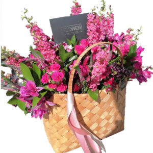 Blueberry-Pink Roses In Rattan Bag