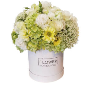 Lime Symphony, a vibrant mix of roses, lisianthus, hydrangea, chrysanthemums, and trachelium